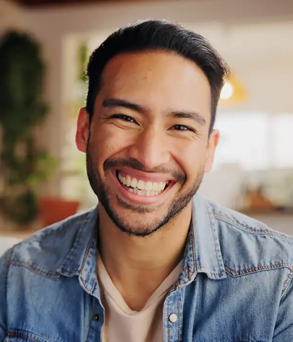 adult asian man with a great big smile